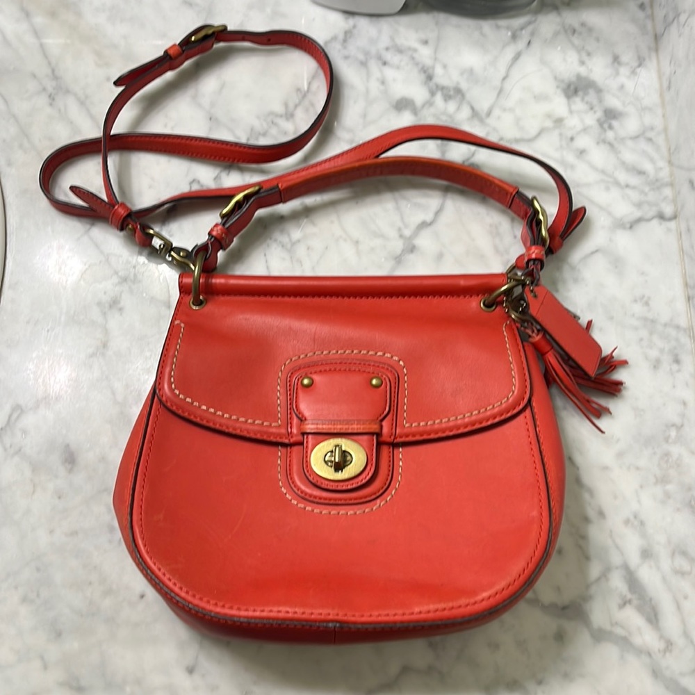 Dark orange Coach purse